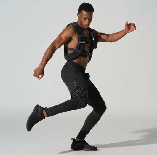 Athlete training in a black Stravo weighted vest